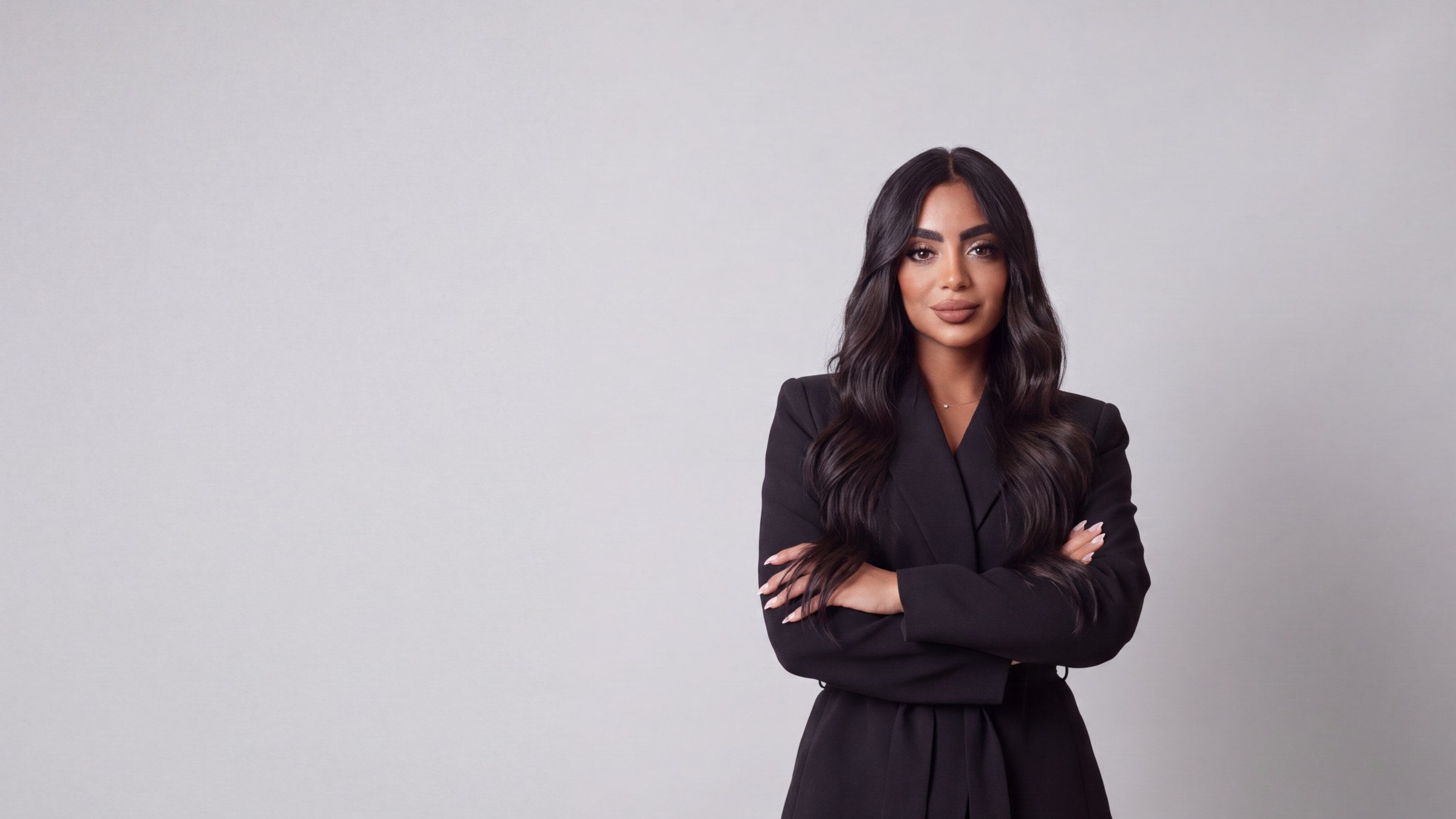 Samarys Rivera, founder of PIOSA, in a black suit